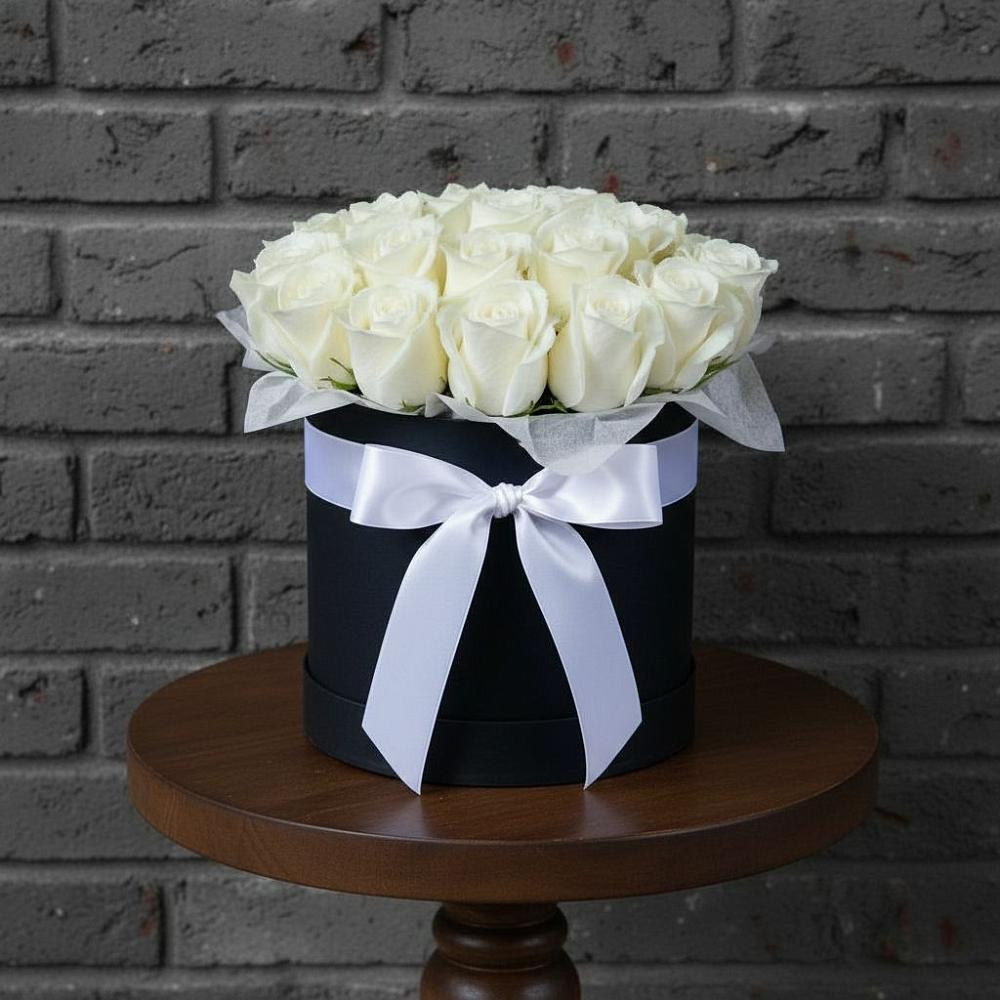 Цветочная композиция из Розы в шляпной коробке в Пионерский Ханты-Мансиский АО